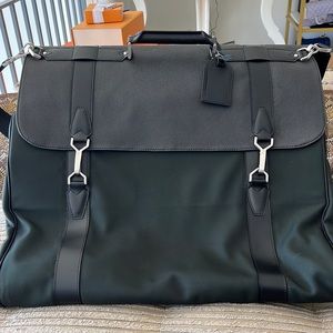 Louis Vuitton Taiga Gibeciere Garment Bag 💼